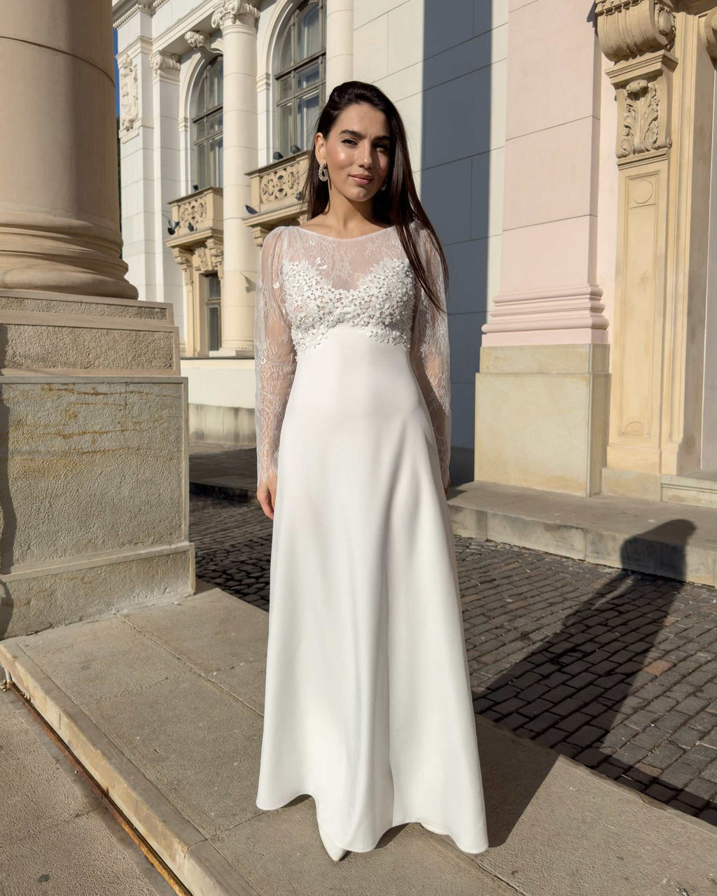 Robe de mariée élégante avec manches en dentelle