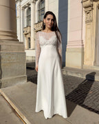 Robe de mariée élégante avec manches en dentelle