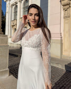 Robe de mariée élégante avec manches en dentelle