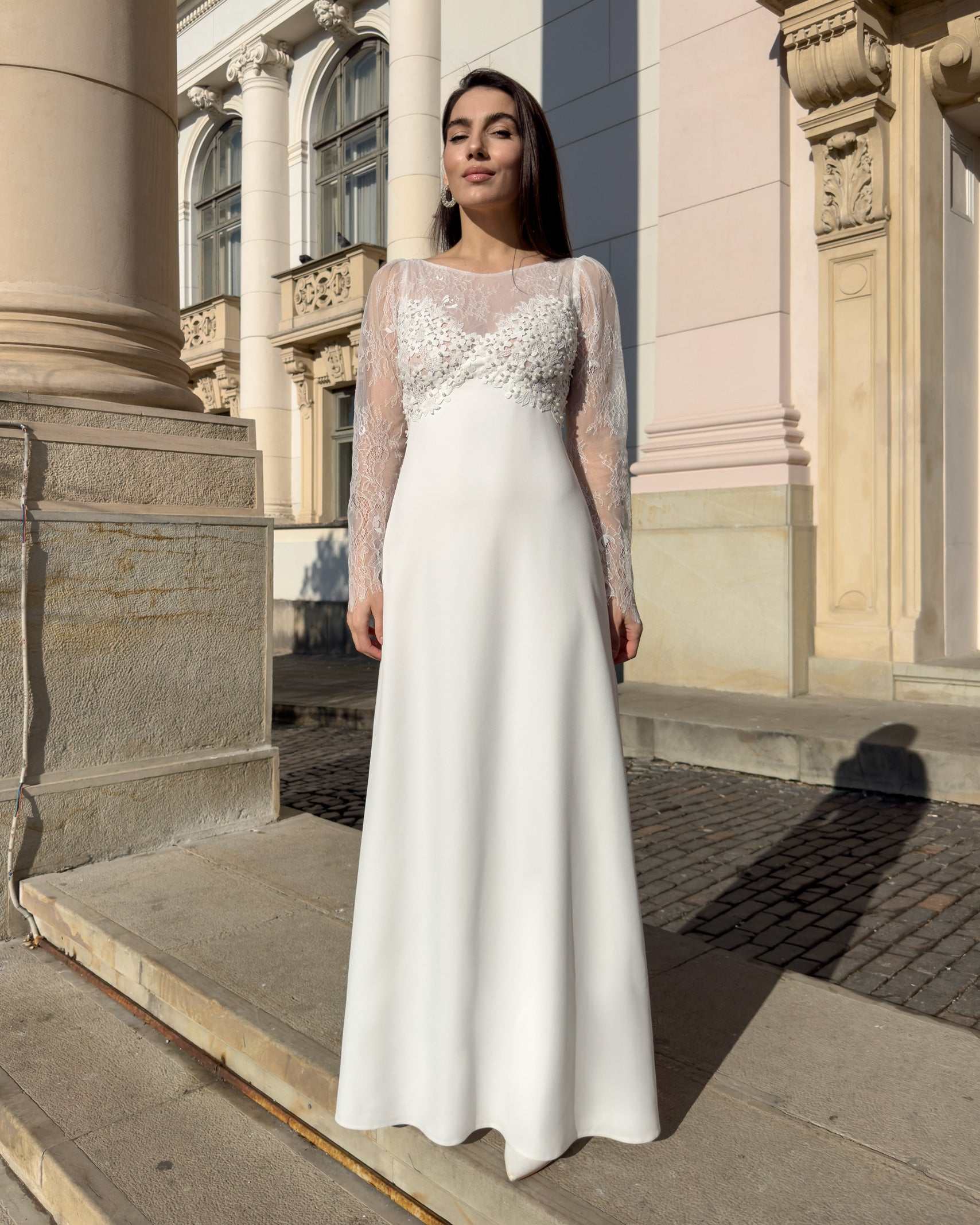 Robe de mariée élégante avec manches en dentelle