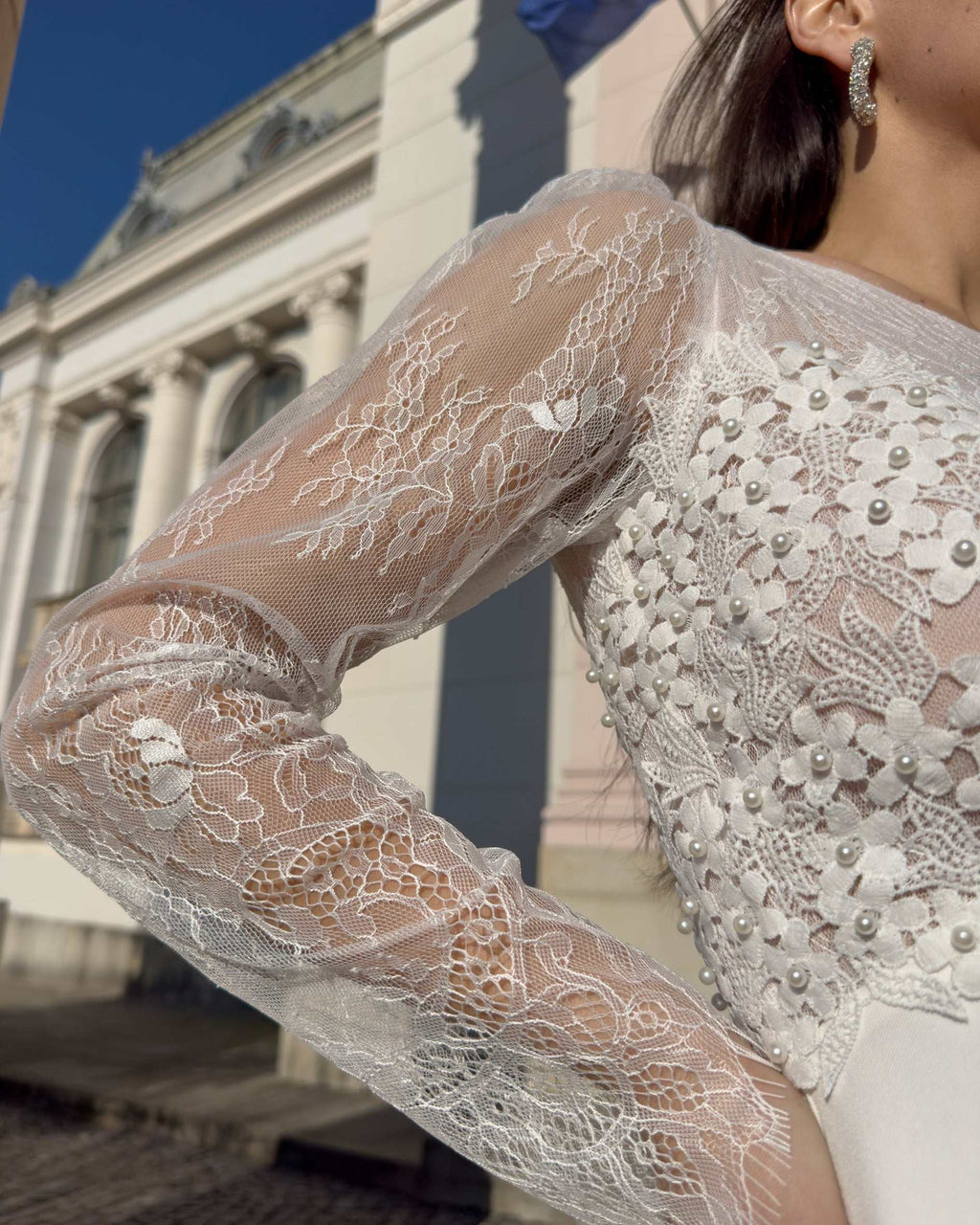 Robe de mariée élégante avec manches en dentelle