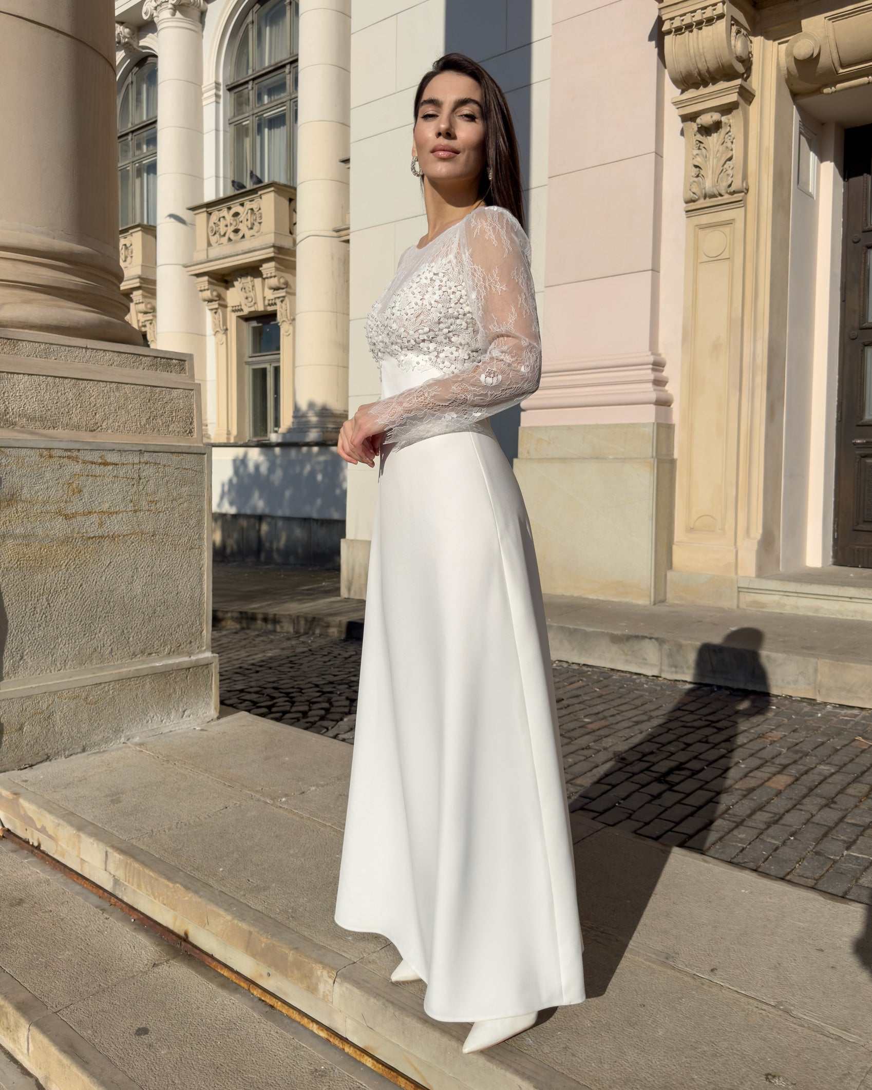 Robe de mariée élégante avec manches en dentelle