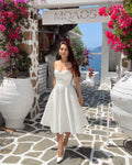 Robe blanche courte fabuleuse avec corset et décolleté